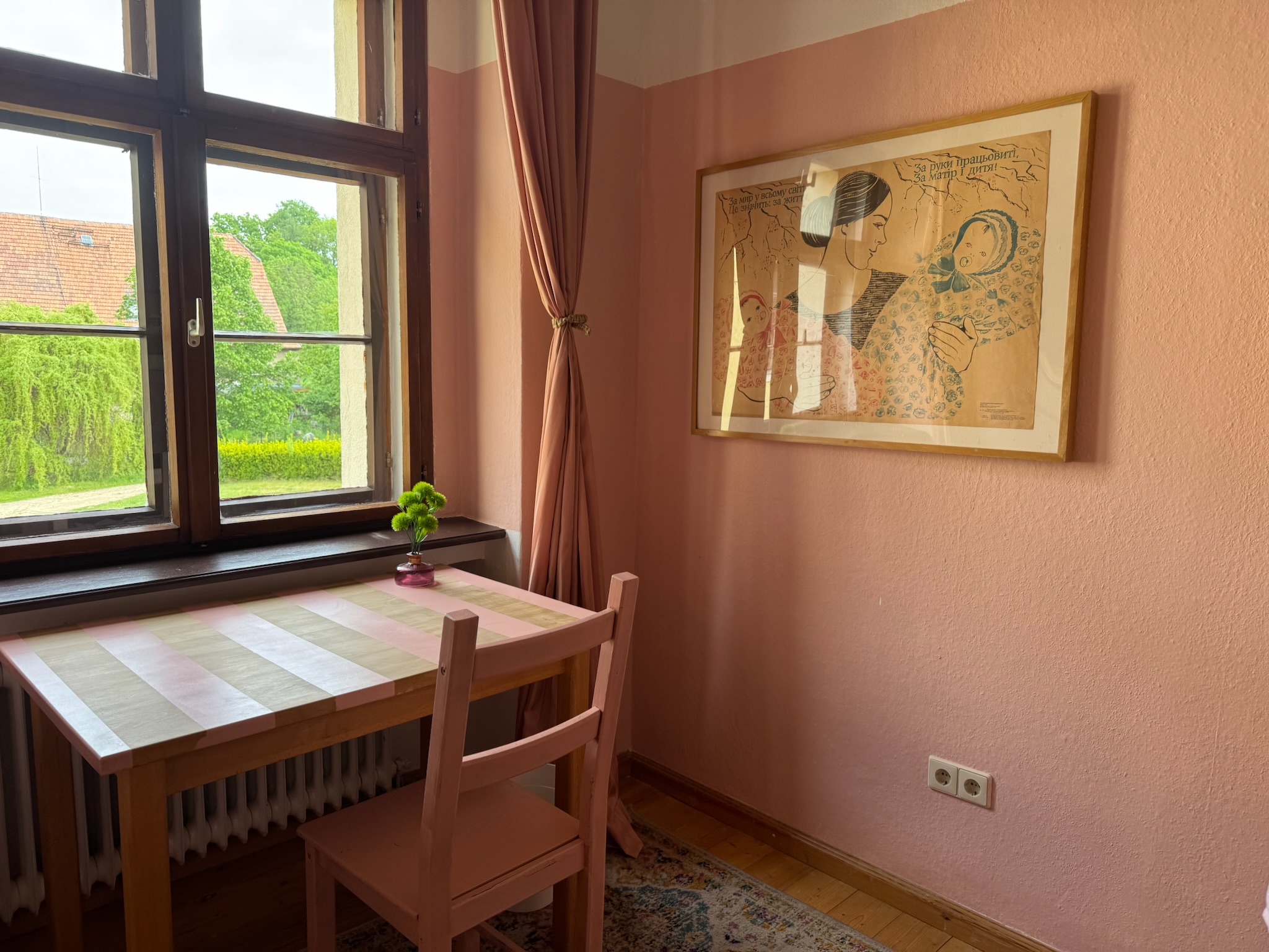 Pink room desk by window